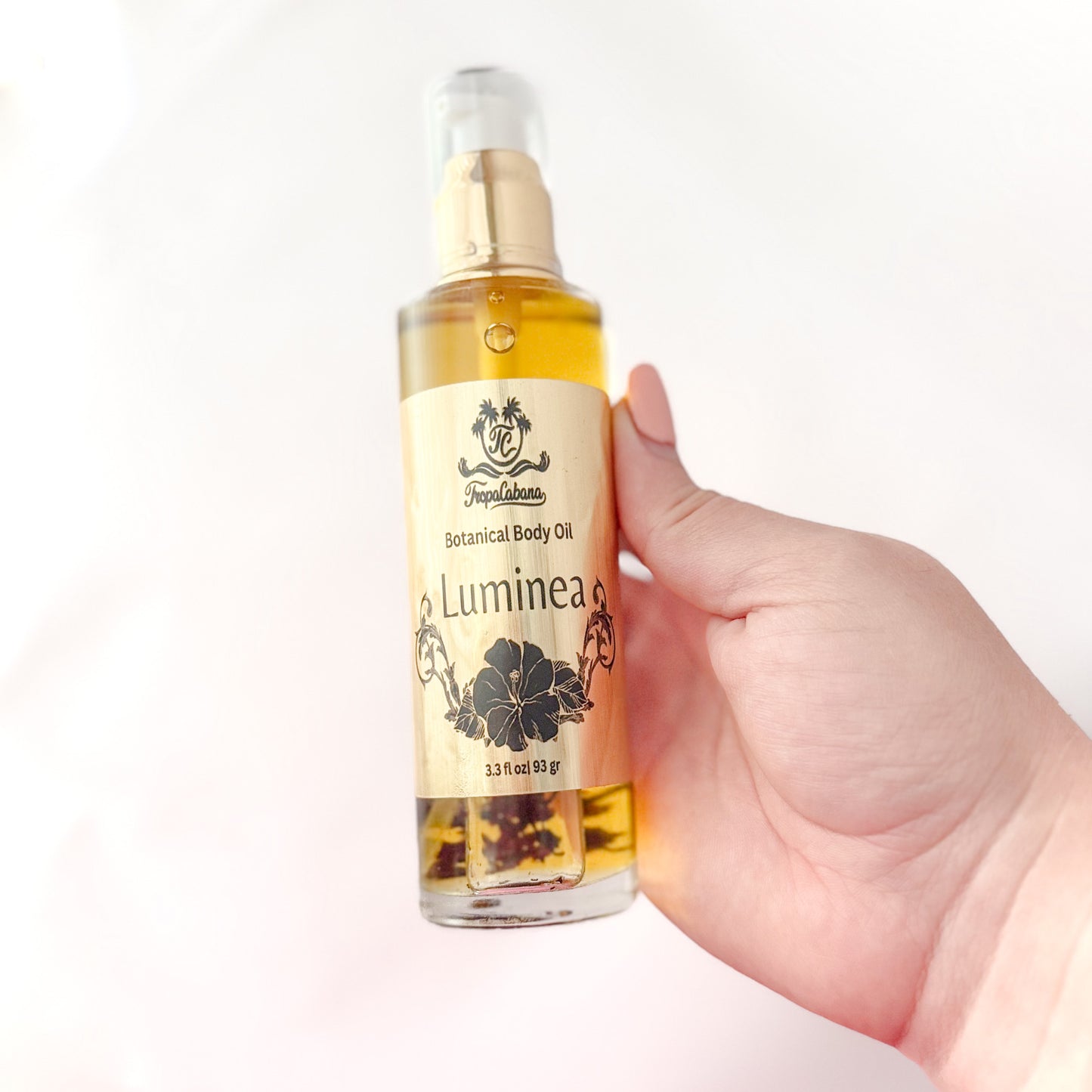Luminea Botanical Body Oil presents a luxurious infusion of carefully selected botanical extracts, meticulously crafted to elevate your skincare experience. Enriched with the essence of hibiscus flowers, this indulgent body oil offers a symphony of benefits tailored to nourish, rejuvenate, and soothe your skin.